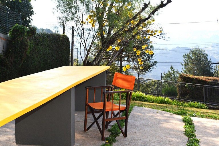 Architect's house with view, garden and fireplace