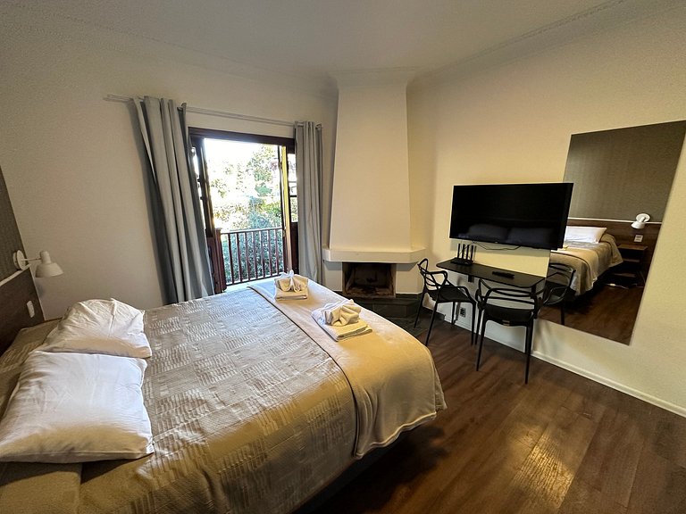 Cama Queen com arrumação diária