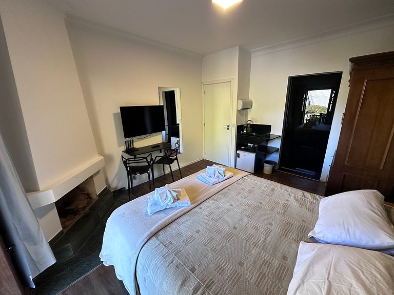 Cama Queen com arrumação diária