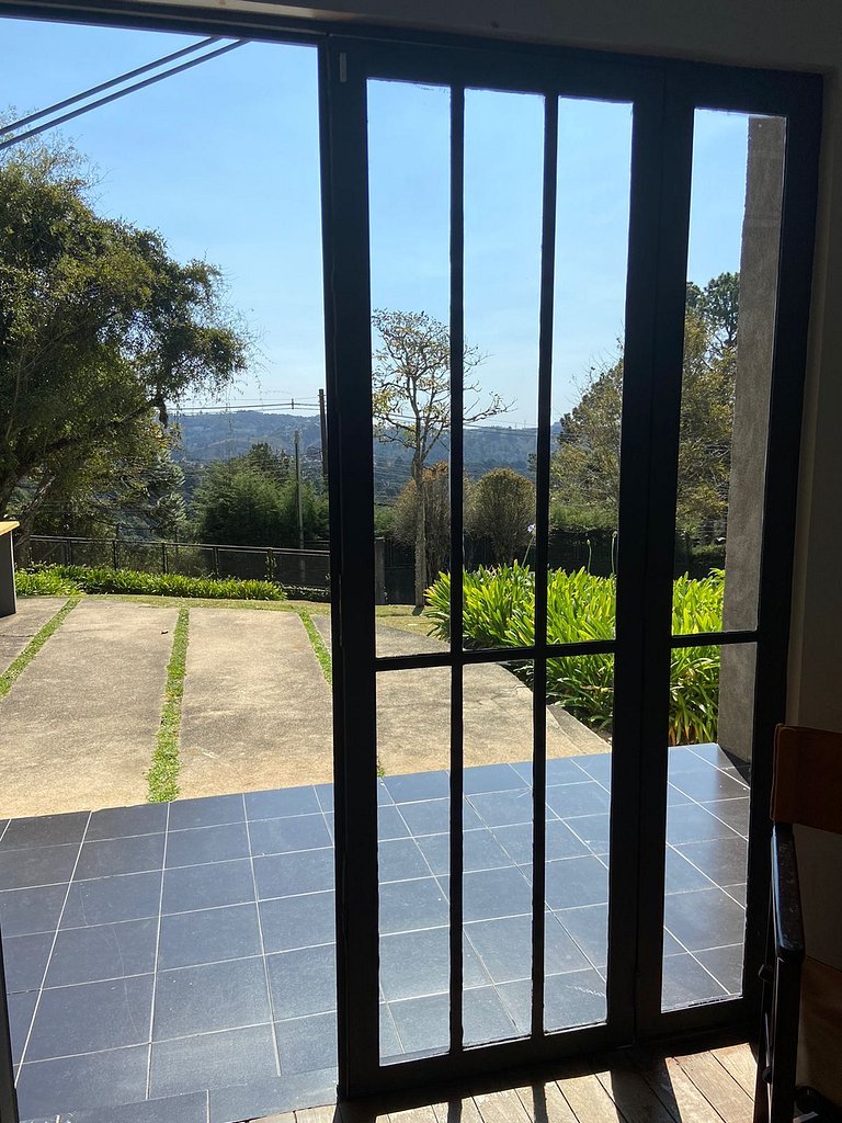 Architect's house with view, garden and fireplace