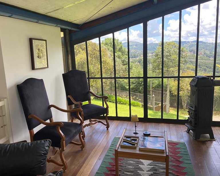 Architect's house with view, garden and fireplace