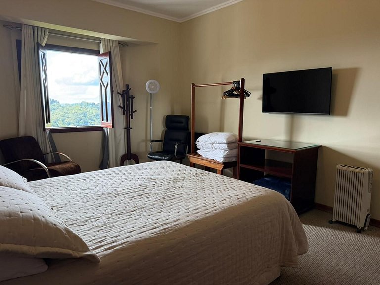 Apartamento com lareira y vista al atardecer