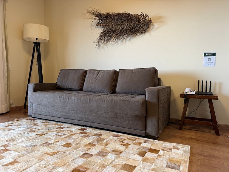 Flat com varanda e conforto nas montanhas