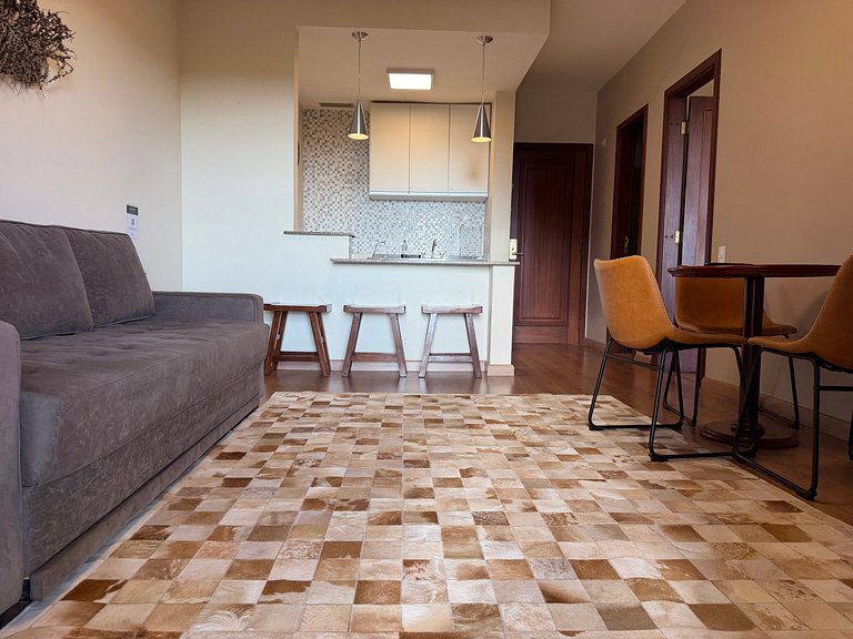 Flat com varanda e conforto nas montanhas