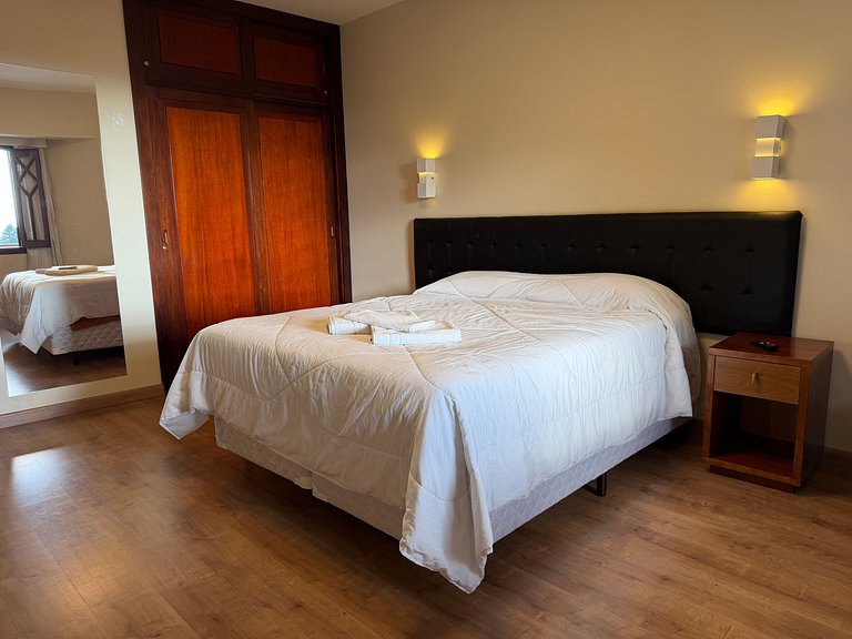 Flat com varanda e conforto nas montanhas