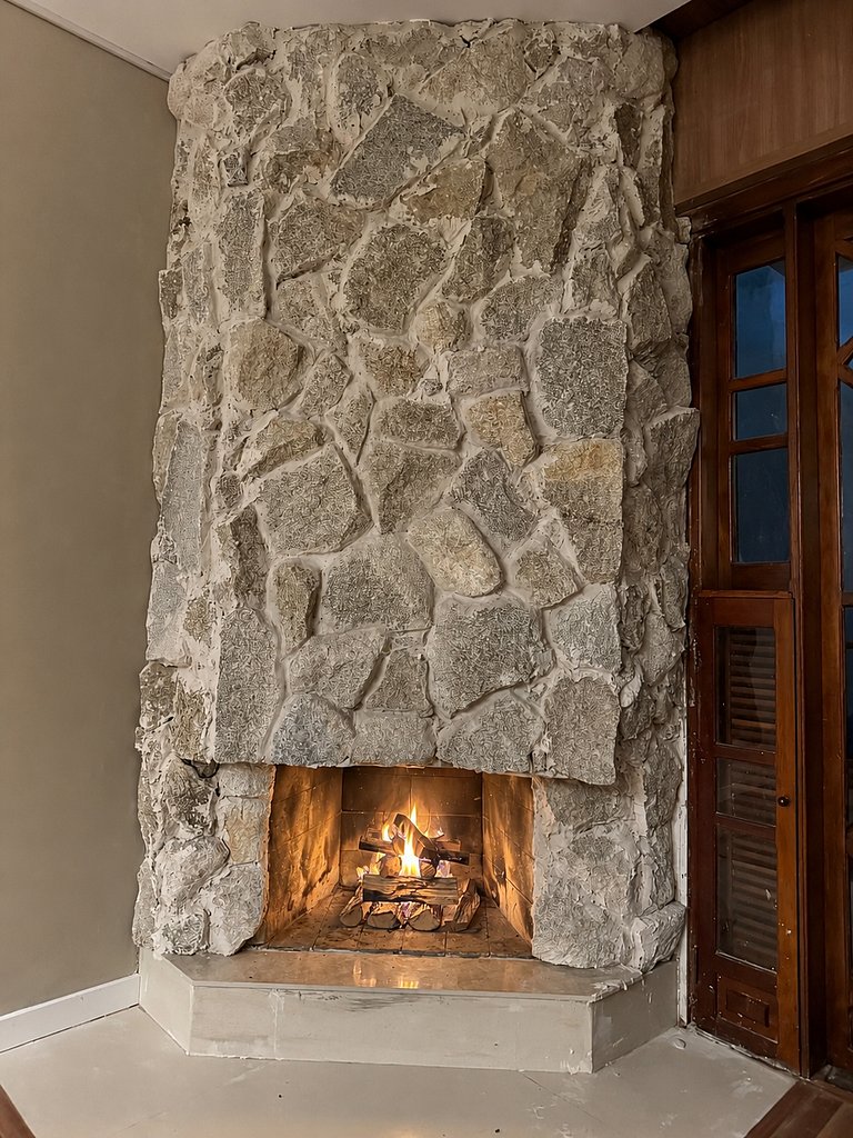 Fireplace, equipped kitchen, and amazing view