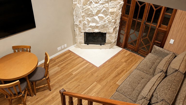 Fireplace, equipped kitchen, and amazing view