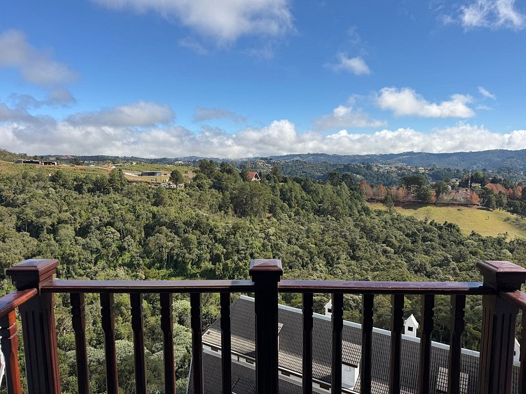 Fireplace, equipped kitchen, and amazing view