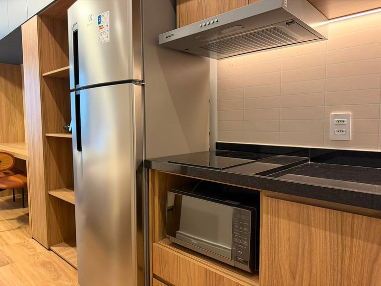 Estudio Vila Madalena • Air acondicionado y cocina