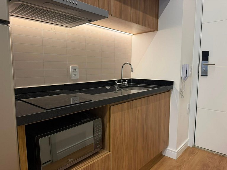 Estudio Vila Madalena • Air acondicionado y cocina